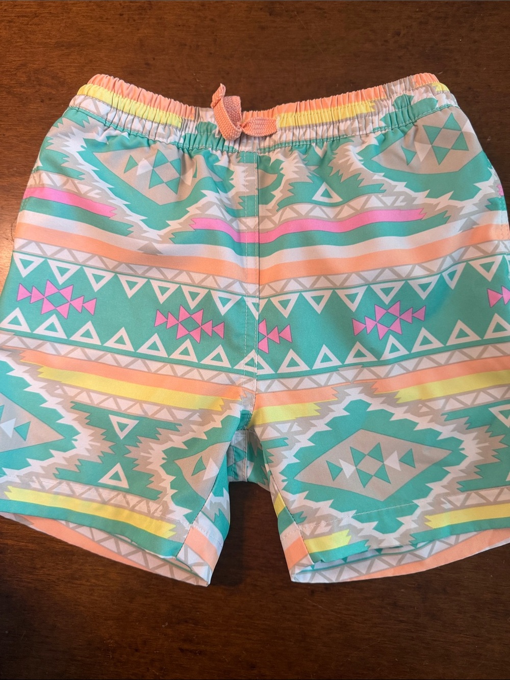 chubbies Kids Aqua Teal Swim Trunks with Pink, Yellow, Peach Stripes